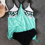 Carmina | Tankini de color sólido con estampado de panteras