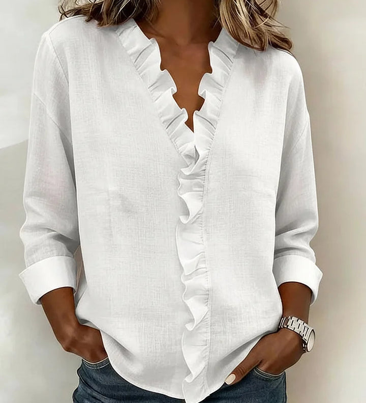 Indie · Blusa con volantes y cuello en V