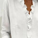 Indie · Blusa con volantes y cuello en V