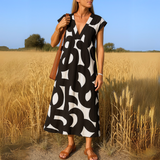 Magda | Vestido fluido con escote en V