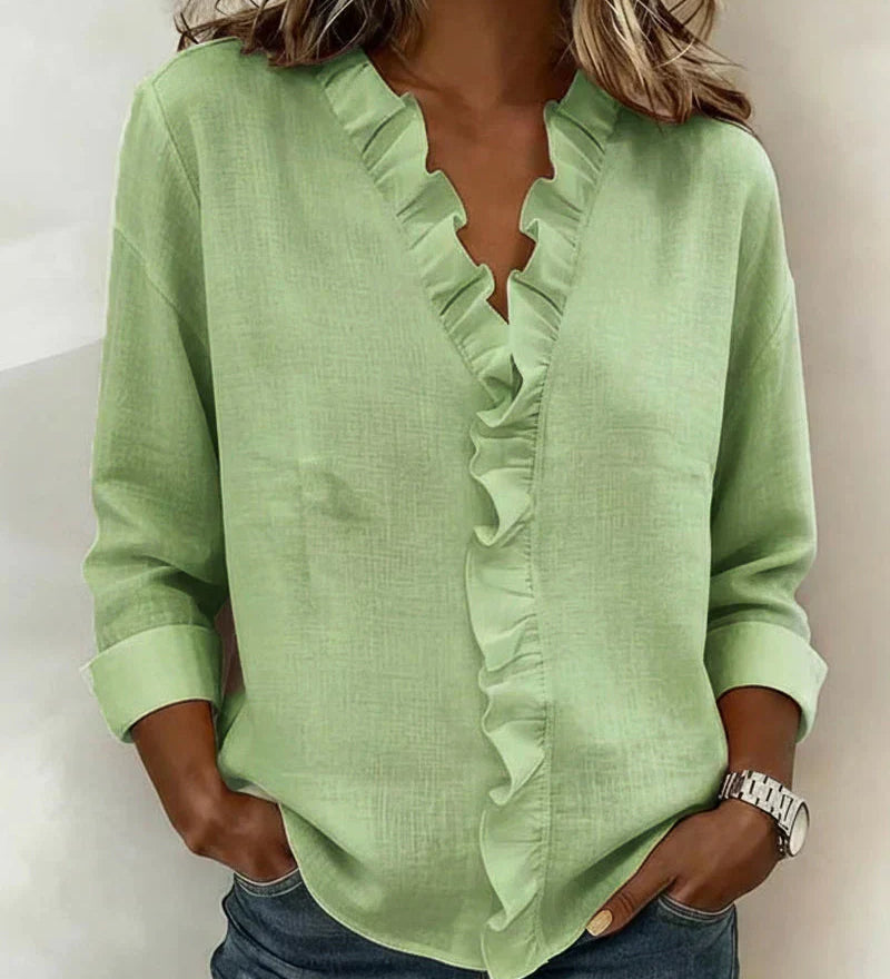 Indie · Blusa con volantes y cuello en V