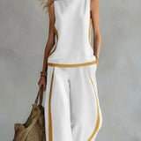 Leila - Conjunto elegante y casual de chaleco y pantalones de algodón y lino gris con bordes en dos tonalidades.