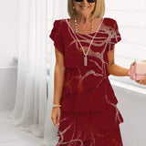 Camelia | Vestido elegante y fluido con volantes