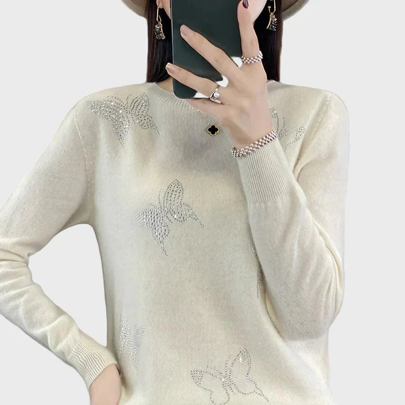 Cuello vuelto de punto con diseño de mariposa
