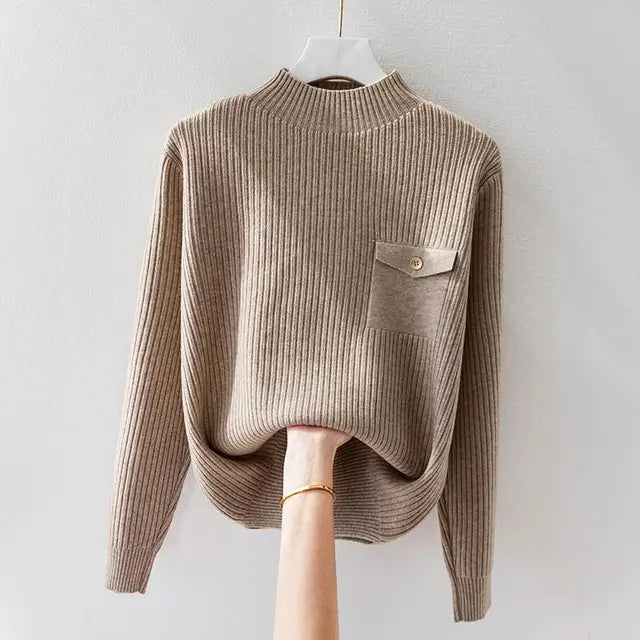 Elegante suéter de cuello alto de punto