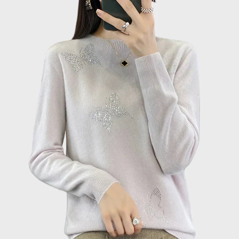 Cuello vuelto de punto con diseño de mariposa
