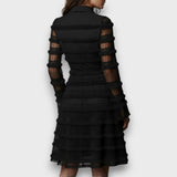Paulina | Vestido midi transparente con flecos