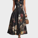 Elsa | Vestido midi plisado con estampado floral
