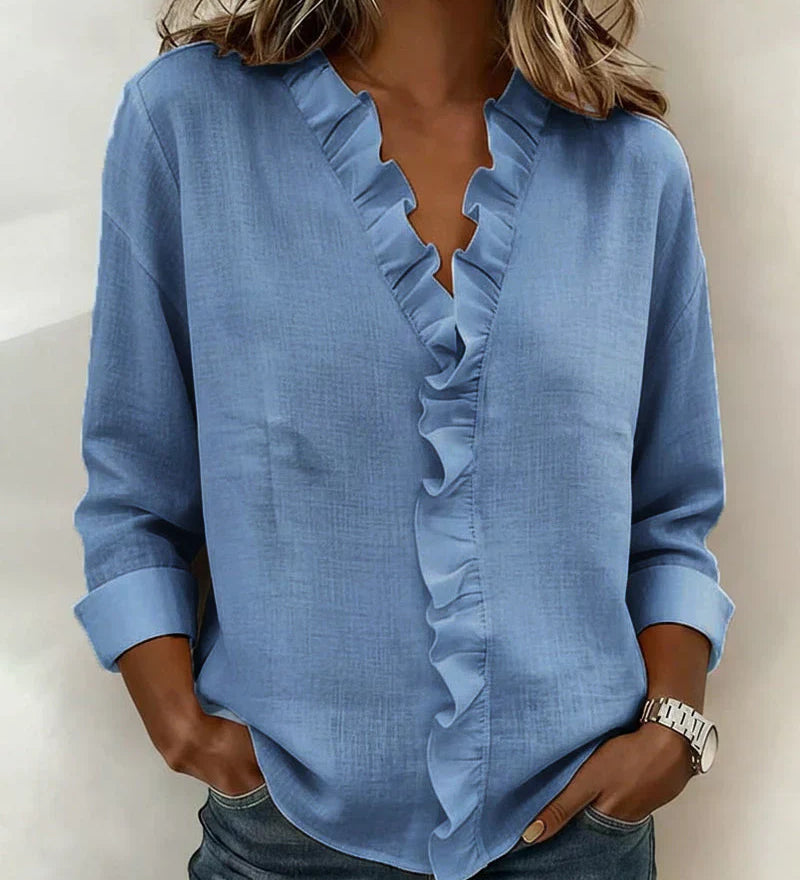 Indie · Blusa con volantes y cuello en V