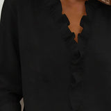 Indie · Blusa con volantes y cuello en V