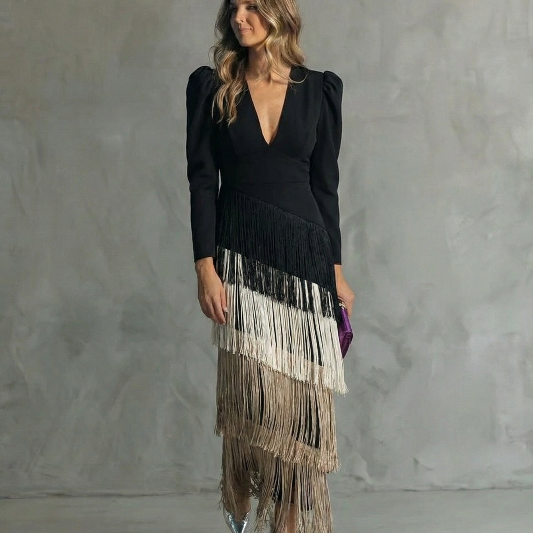 Clara™ | Elegante vestido midi con mangas con flecos