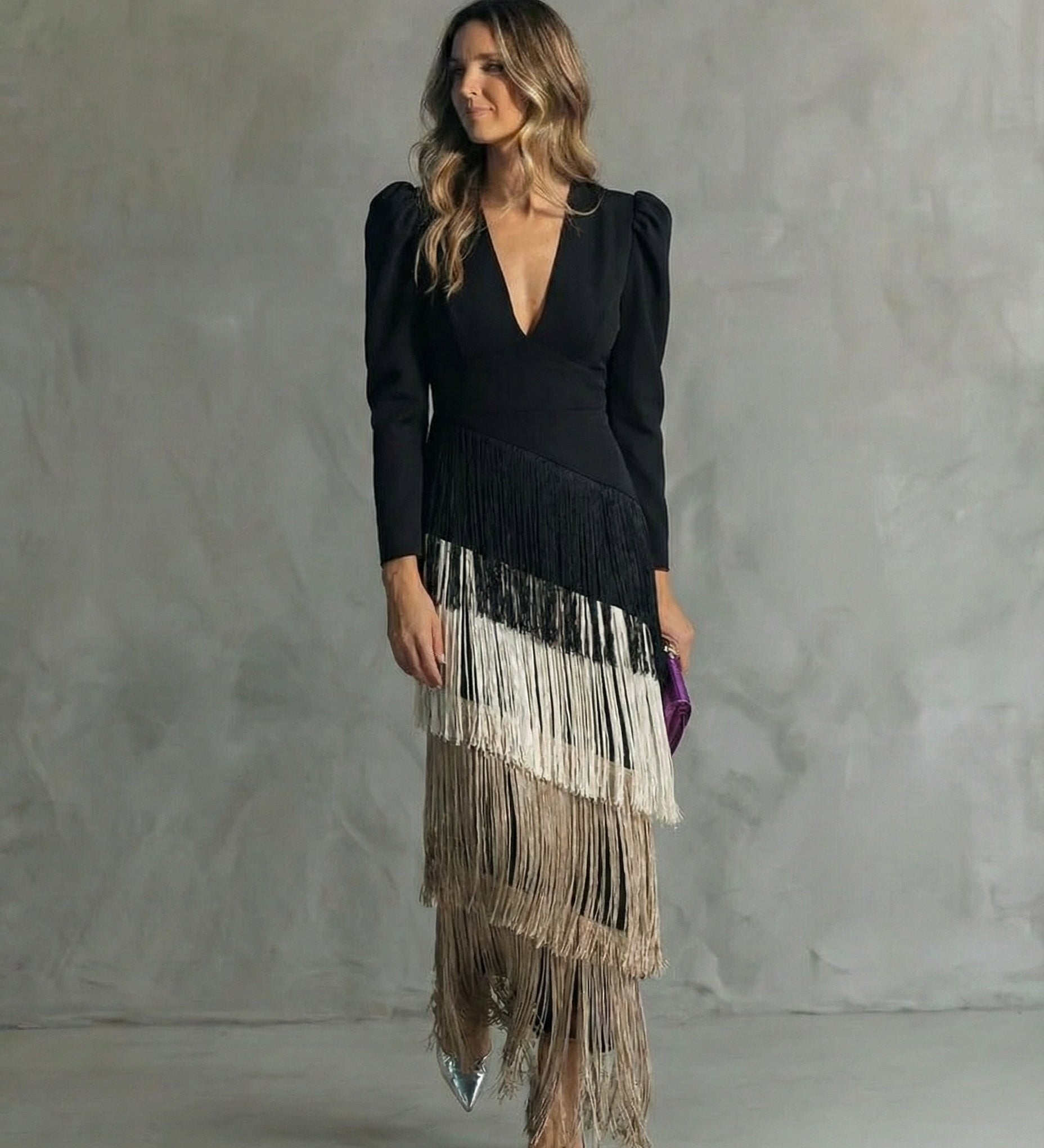 Clara™ | Elegante vestido midi con mangas con flecos
