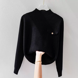 Elegante suéter de cuello alto de punto